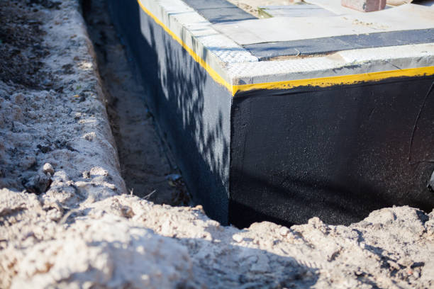 Professional Interior Drainage System technician working in Portland, IN